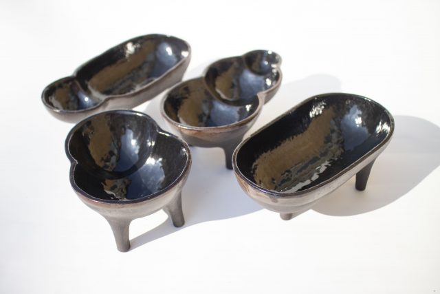 black clay ceramic vase pot legs